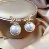 Pendientes Vintage Estilo Francés con Ojo de Gato Incrustado de Diamantes y Perlas, Pendientes de Lujo Ligero de Gama Alta, Exquisitos y Modernos Accesorios para Orejas Versátiles al por Mayor