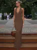 Vestido longo sexy slim-fit de verão 2026, estilo europeu e americano, cor sólida, sem costas, gola halter, sem mangas, com amarração, decote V profundo