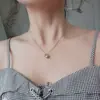 Collar de Acero de Titanio Dorado para Mujer, Colgante de Perla Redonda Sólida Mate, Nueva Cadena para Clavícula Estilo Coreano, Cadena para el Cuello Antidesvanecimiento Venta al por Mayor