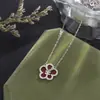 Collar de flor de dinero de la suerte de plata pura 999 para mujer, colgante de flor de ágata roja y diamante versátil de nicho, cadena para clavícula nueva 2026