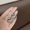 Pendientes vintage largos con flecos, un accesorio de moda de nicho y versátil, ligeros y lujosos, que exudan elegancia y sofisticación, con postes de plata