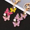 Llavero de Coche con Borla de Mariposa de Perla Anillo de Llavero Colgante Lindo de Metal para Bolsos de Mujer Regalos Creativos para Colgar