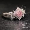 Cao Shi eBay novos acessórios criativos Cross enrolamento diamante rosa anel de zircão senhoras jóias de mão Coringa diário