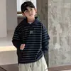 Sudadera con capucha de otoño para niños 2026 nueva de moda para niños mayores, estilo genial para el otoño, imitación de dos piezas, camiseta base