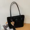 Bolso de leopardo de alta gama transfronterizo para mujer, nuevo bolso de hombro retro de gran capacidad para el día a día 2026, bolso tote simple y moderno