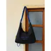 Bolsa de Lona Grande Capacidade Estilo Coreano Feminina 2026 Nova Casual Versátil Bordado de Letra Ombro Único Transversal
