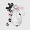Dulce y Fresco Elegante Moda Ccb Strass Aceite Goteando Corazón Cruz Arco Garra de Gato Hueco Estrella Llavero DIY