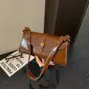 Bolsa de Mão Retrô de Nicho Feminina 2026 Nova Bolsa Transversal Simples e Chique Bolsa Quadrada Pequena Casual Bolsa de Ombro para Comércio Exterior