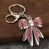 Anel de chaveiro de liga de zinco em formato de laço com strass, pingente de chave de metal, acessório DIY para chaveiro de carro e bolsa