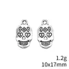 10x17mm 1.2g Color Plata Antigua DIY Accesorios de Exportación Más Vendidos Cráneo Tallado Patrón Colgante