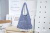 2024 Transfronterizo Nuevo Bolso de Playa Japonés y Coreano Bolso de Tejido de Punto Europeo y Americano Bolso Hueco Bolso de Hombro Bolso Tejido para Mujer