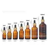 Botella dispensadora de aceites esenciales a prueba de luz engrosada 10 ml 30 ml Botella de aceites esenciales con tapa gotero Botella de aceites esenciales de vidrio Botella vacía Gama alta