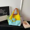 Bolso de mano de bloqueo de color estilo coreano, bolso tote nuevo primavera 2026, bolso de nailon ligero y moderno para mujer