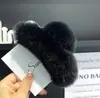 Clip para el pelo de pelo de conejo real nuevo de Corea del Sur Clip para el pelo retro extragrande para mujer Clip de tiburón Sensación de alta calidad Clip de agarre de felpa para la parte trasera de la cabeza