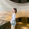 Otoño 2025, nueva camiseta sexy de manga larga sin espalda para mujer, diseño combinable, cuello en U, color sólido, camiseta de chica sexy.