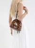 Bolso Cubo de Nicho Súper Popular Transfronterizo para Mujer 2025 Nuevo Estilo Punk Europeo y Americano Bolso Bandolera con Remaches Bolso Cruzado