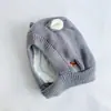 Gorro de bebé otoño e invierno más terciopelo lana gorro de punto súper lindo para bebés hombres y mujeres gorro de protección para orejas de bebé gorro cálido de protección facial para bebé