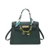 Bolsa feminina de nicho de alta qualidade 2026 nova primavera vintage versátil bolsa transversal bolsa de mão versátil casual bolsa Kelly