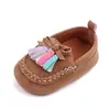 Zapatos casuales Tods suela de goma antideslizante para bebé zapatos de bebé con borla zapatos para niños pequeños al por mayor 2680