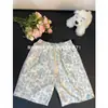 Shorts florales retro geniales para hombre, finos de verano, corte holgado, talla grande, estilo hawaiano, de seda helada, modernos, hasta la rodilla