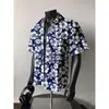 Camisa de flores de playa para hombre, de manga corta, de verano, fina, de marca moderna, estilo hawaiano, para playa, elegante, para vacaciones, chaqueta holgada