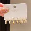 Set de Seis Piezas de Pendientes de Uña de Zircón Retorcidos Bañados en Oro Real de 14K, Pinzas para Orejas de Lujo Ligero de Gama Alta, Accesorios para Orejas de Moda y Únicos