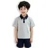 Camisa polo de manga corta para niño, tejido de punto con patchwork de mezclilla, top versátil casual de verano, envío directo del fabricante