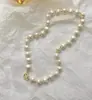 Collar especial con hebilla otbuckle de perla grande en forma de huevo ovalado, cadena para la clavícula de perla de imitación con costuras de cuentas de cobre, temperamento femenino, celebridad de internet, moda