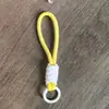 Cordón con Llavero de Funda de Teléfono de Bloques de Color Anudado, Cadena Creativa Tejida Corta para Botella de Agua, Llavero, Correa Desmontable Anti-Pérdida de 12 cm