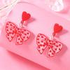 Novos brincos de design de amor com pontos de arco transfronteiriços, personalidade do Coringa, moda coreana, fábrica de atacado