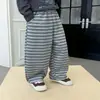 Pantalones de otoño para niño, modernos y elegantes, modelo nuevo 2026, pantalones jogger casuales de moda para niños con dobladillo curvo