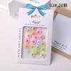 Nuevo producto más vendido joyería para uñas de flor con cara sonriente que cambia de color al sol pasador DIY hecho a mano material para funda de teléfono Accesorios Venta al por mayor