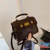 Bolso de mano versátil para el día a día 2026, bolso cuadrado pequeño elegante y único para mujer, bolso de hombro retro