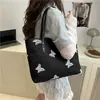 Bolsa de Ombro de Lona com Flor em Relevo Estilo Nacional Bolsa de Cosméticos Feminina Bolsa Tote Jacquard de Alta Qualidade 2025 Nova Bolsa Feminina