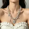 Collar de cuentas de estrella de mar, conchas y cuentas estilo vacación de playa transfronteriza europeo y americano para mujer, collar de cadena para clavícula multicapa bohemio