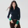 Nueva colección de otoño e invierno: suéter de cachemir versátil para mujer con cierre de media cremallera, puños de color contrastante, mangas largas, corte ajustado y un diseño elegante que favorece la figura