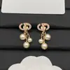 Pendientes Redondos de Perla Nuevos de la Marca Dior/Dior Pendientes Tachonados con Diamantes Letra Cd Moda Europea y Americana Pendientes Versátiles para Mujer Venta al por Mayor