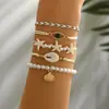 Pulsera de Cordón Trenzado Estilo Vacaciones de Verano Nuevo Europeo y Americano Pulsera de Playa Estrella de Mar Concha Perla Pulsera Trenzada de Cordón Ajustable