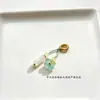 Precio mayorista directo de fábrica pulsera hecha a mano pulsera con colgante diy accesorios pequeños deslizantes colgante de garra de gato lindo Joker
