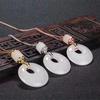 Atacado de fábrica Jade Xinjiang ouro Jade fivela de segurança Jade branco Jade ouro pingente de clavícula pingente S925 pingente de jade de prata