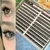 Popular juego de pegamento para comercio exterior 100 piezas, maquillaje de ojos de chica hot mestiza, rizado y fijación, ojos profundos y grandes, pestañas postizas transfronterizas