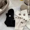 Calcetines de otoño e invierno para mujer, forrados de felpa y engrosados para calidez en casa, calcetines de terciopelo de visón con jacquard de dibujos animados, elásticos y fáciles de combinar, calcetines superpuestos