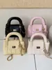 Moda Minimalista Transfronteiriça 2026 Nova Coleção Primavera/Verão Feminina Design de Nicho Exquisito Alta Qualidade Bolsa Quadrada Pequena de Ombro Cruzado