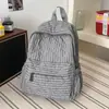 Mochila de estilo coreano para o outono de 2026, transfronteiriça, de grande capacidade, leve, simples e casual, para estudantes do sexo feminino.
