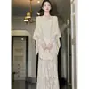 Nuevo traje de estilo francés para otoño e invierno, corte ajustado, con falda y chaqueta, hecho de poliéster, directo de fábrica, con etiquetas y pedrería