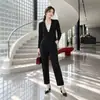 Traje pequeño de solapa con un botón y cuello en V de manga larga Miyake para mujer conjunto de otoño cintura elástica pantalones largos fluidos conjunto de dos piezas
