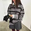 Corea del Sur Dongdaemun 2026 Otoño/Invierno Suéter de lana holgado a rayas con cuello polo