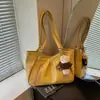 Bolso de hombro minimalista estilo coreano, bolso tote retro, bolso de mano de moda y versátil para el trabajo, nuevo para el otoño de 2026, transfronterizo