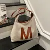 Bolsa Vintage de Grande Capacidade com Temperamento para Mulheres 2026 Nova Casual Estilosa Versátil para o Dia a Dia Bolsa de Ombro Mochila
