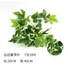 Venta al por mayor del fabricante Hoja individual Rábano verde Hoja de taro Arreglo floral Planta artificial Pequeño manojo Planta Pared Accesorios de plantas verdes Venta al por mayor